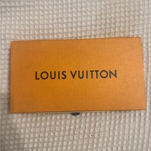 Louis Vuitton Signature- Authentic . I have receipt and card